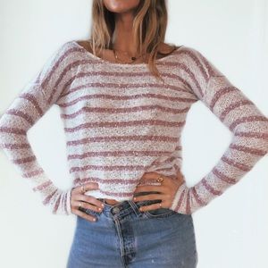 White, maroon striped knit sweater.